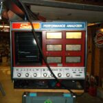 Vintage 1950s car diagnostic computer setup