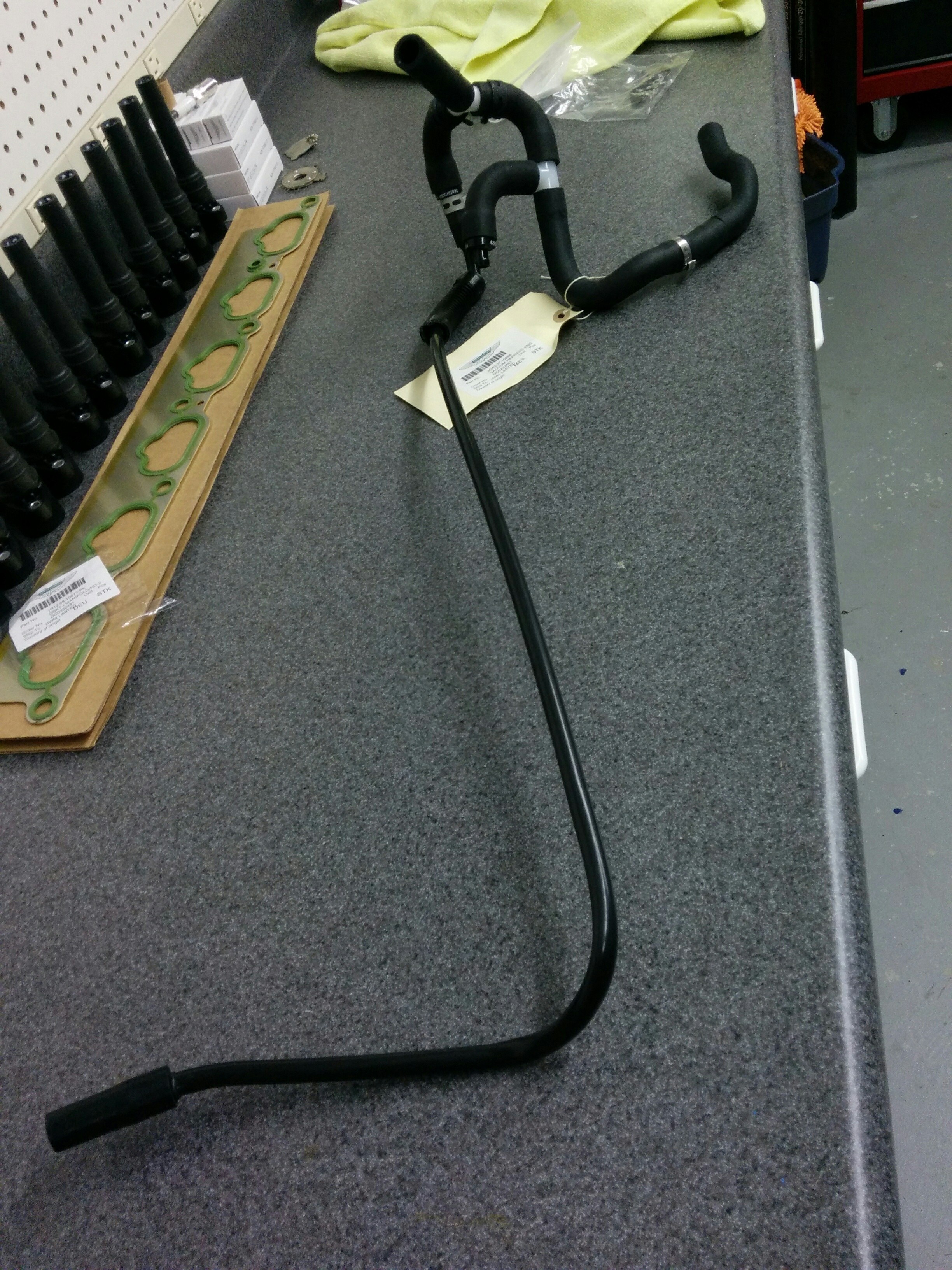A new Vacuum Harness Assembly for an Aston Martin DB9, including pre-installed PCV valves