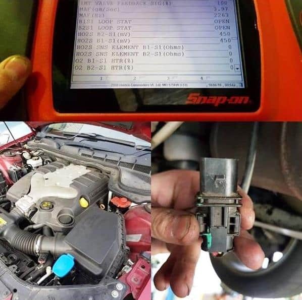 Mechanic using diagnostic scanner on car