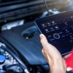 Mechanic Using Diagnostic Tool