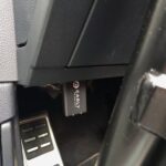 Carly OBD II scanner installed in a car