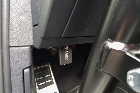 Carly OBD II scanner installed in a car