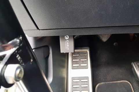 Mechanic using a diagnostic tool