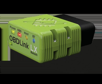 Close-up of OBDLink LX Bluetooth adapter plugged into a car's OBD-II port