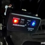 OBD2 scanner connected to a car
