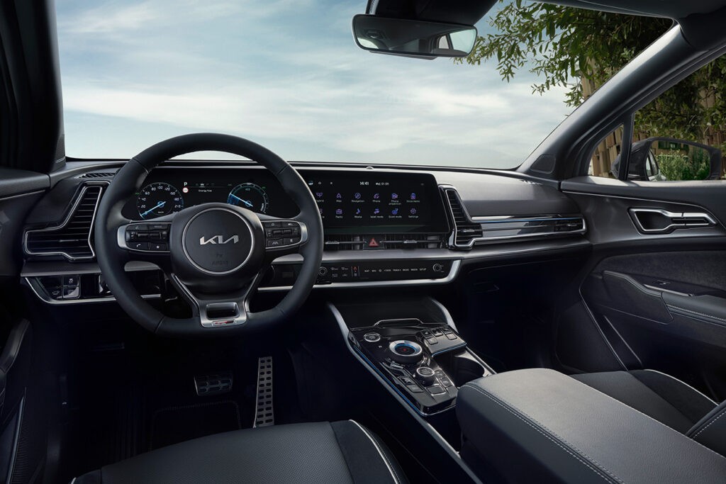 Kia dashboard with infotainment system showing vehicle settings