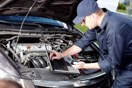 Mechanic Using Automotive Scanner